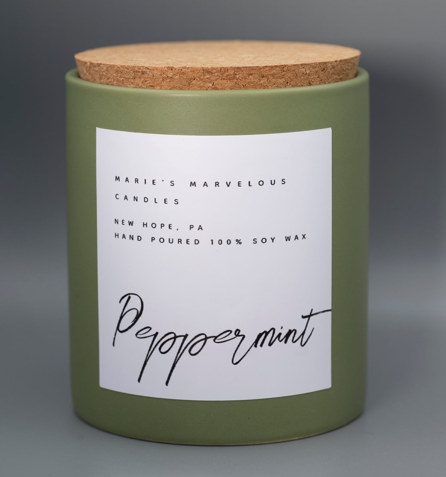 15 ounce Peppermint fragrance in a sage green ceramic jar with fitted cork lid