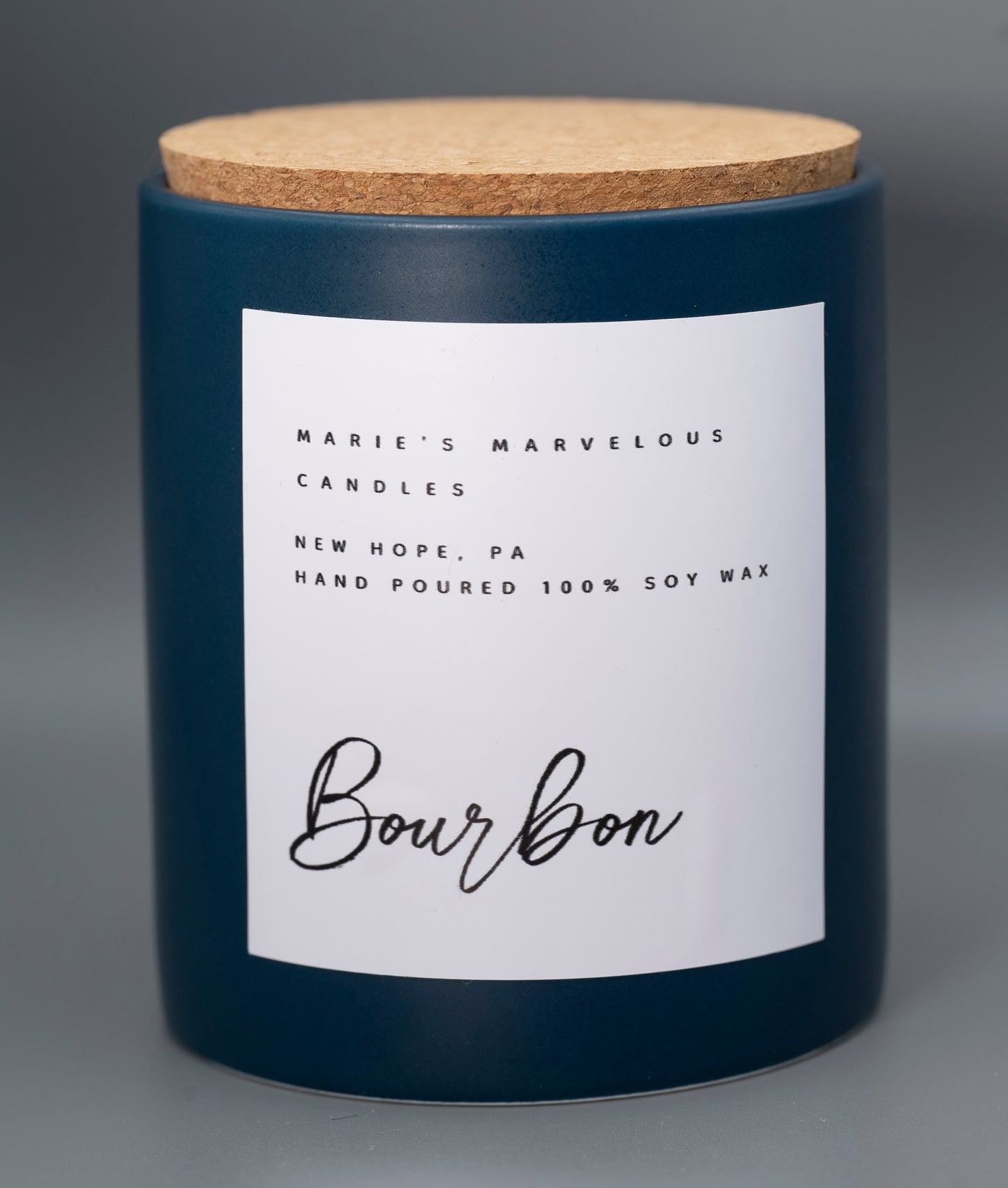 15 ounce Smoked Bourbon fragrance in a blue stone ceramic jar with fitted cork lid