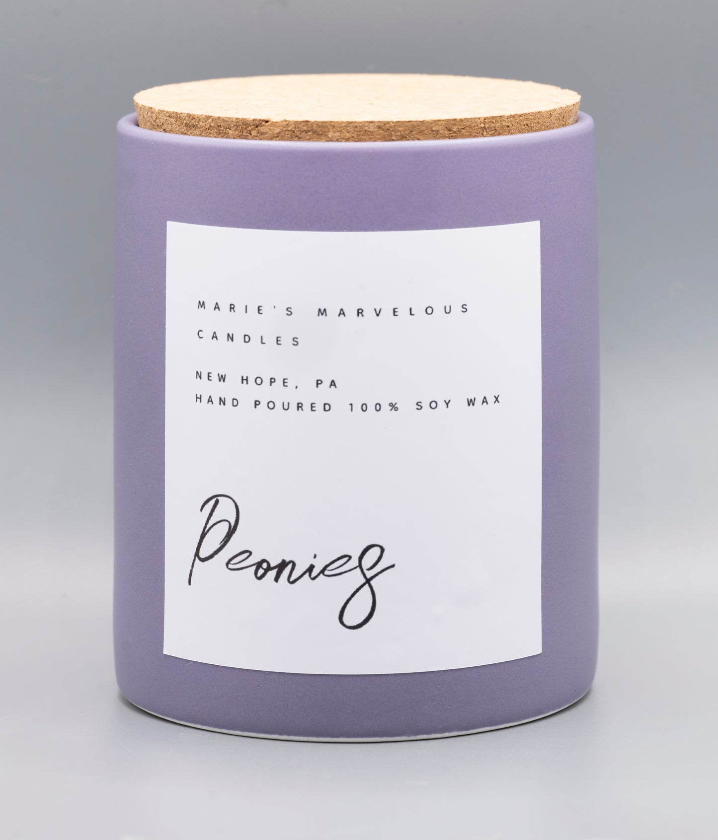 15 ounce Peonies fragrance in an amethyst purple ceramic jar with fitted cork lid