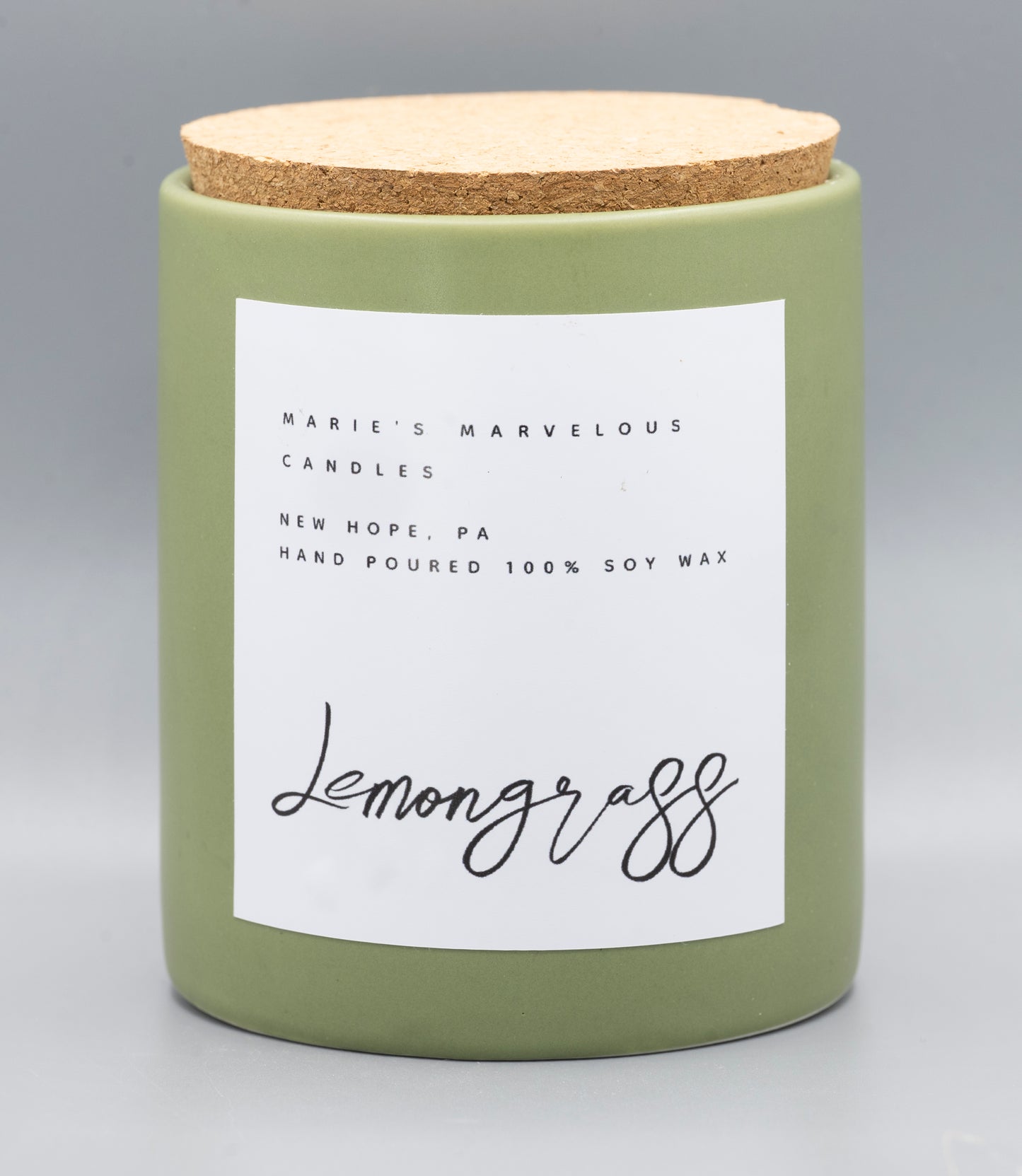15 ounce Lemongrass Sage fragrance in a sage green ceramic jar with fitted cork lid