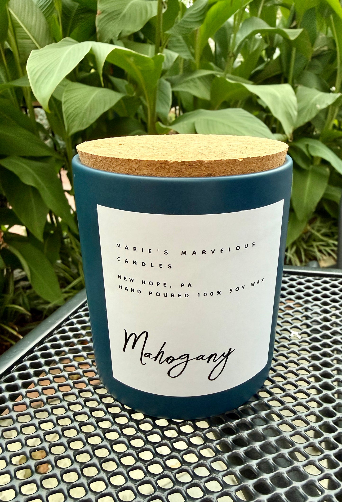 15 ounce Mahogany fragrance in a blue stone ceramic jar with fitted cork lid