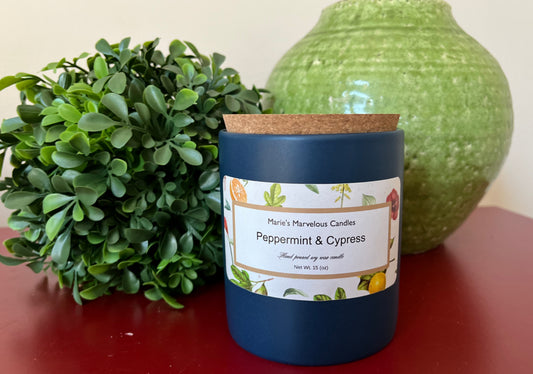 15 ounce Peppermint and Cypress fragrance in a denim blue ceramic jar with fitted cork lid