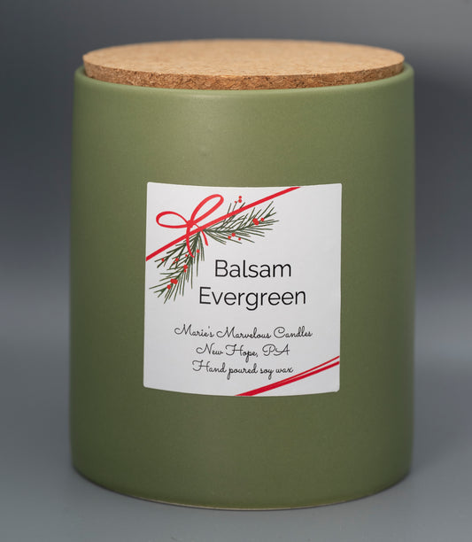 15 ounce Balsam Evergreen fragrance in a sage green stone ceramic jar with fitted cork lid