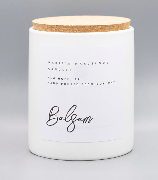 15 ounce Balsam Evergreen fragrance in a white stone ceramic jar with fitted cork lid