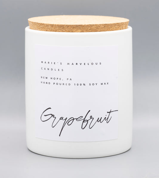 15 ounce Grapefruit fragrance in a white ceramic jar with fitted cork lid