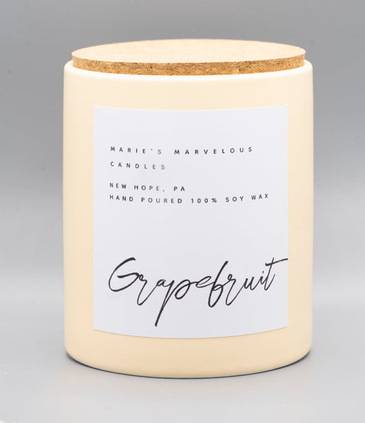 15 ounce Grapefruit fragrance in a buttercream jar with fitted cork lid