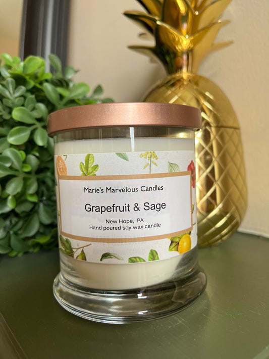 12.5 ounce Grapefruit and Sage fragrance in a status glass jar with rose gold tin lid