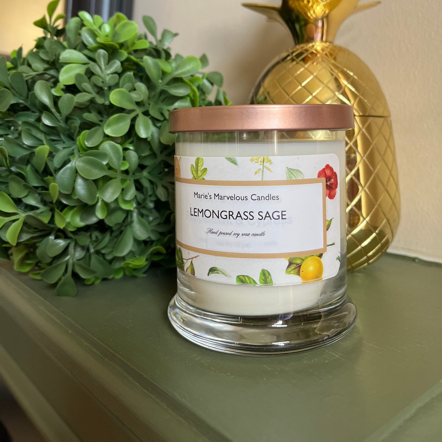 12.5 ounce Lemongrass Sage fragrance in a status glass jar with rose gold tin lid