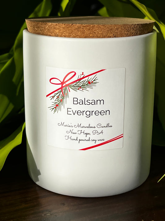 15 ounce Balsam Evergreen fragrance in a white stone ceramic jar with fitted cork lid