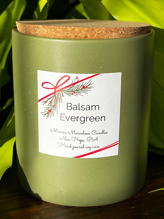 15 ounce Balsam Evergreen fragrance in a sage green stone ceramic jar with fitted cork lid